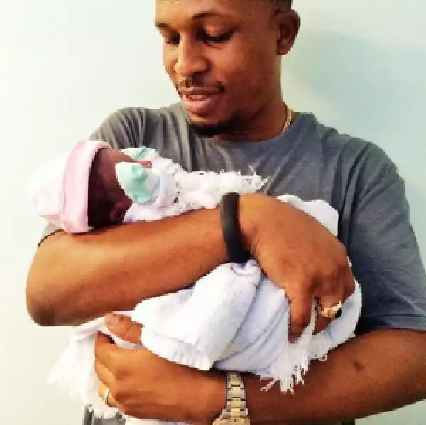 Naeto C shares photo of his new born daughter.